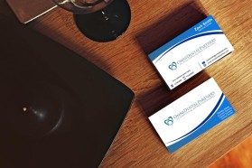 Business Card & Stationery Design Entry 1062207 submitted by jayganesh to the contest for Omni Dental Partners run by potmm